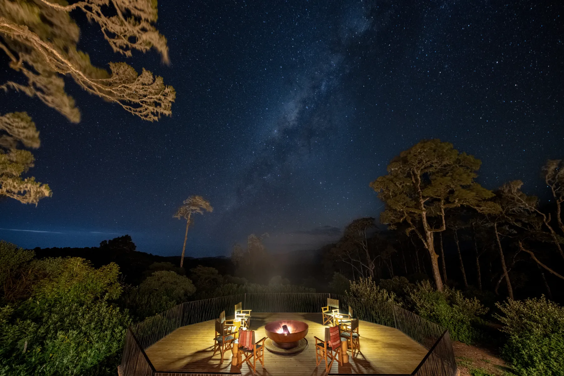 Camp fire under starry skies at Lemala Osonjoi Lodge